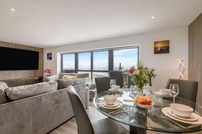 a living room with a table and a couch at 2 Bed in Tintagel oc-g33170 in Tintagel