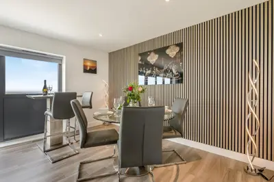 a dining room with a glass table and chairs at 2 Bed in Tintagel oc-g33170 in Tintagel
