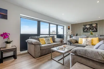 a living room with two couches and a table at 2 Bed in Tintagel oc-g33170 in Tintagel