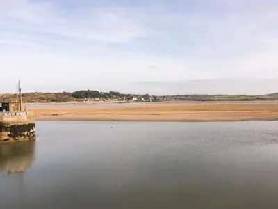 a view of a body of water with a beach at Cozy Retreat in Padstow