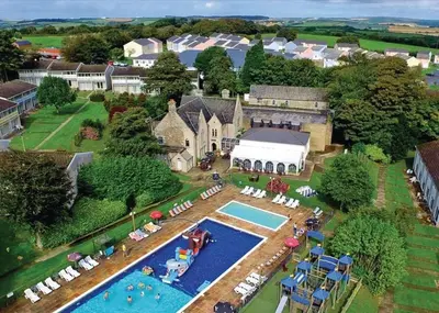 an aerial view of a house with a swimming pool at Atlantic Lodge - 4 Bedroom - Pool -Spa - Gym in Newquay