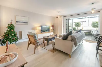 a living room with a christmas tree in it at 3 Bed in Fowey oc-s33234 in Fowey