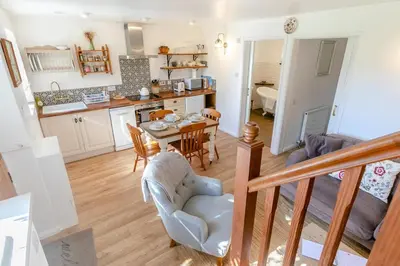 a kitchen and living room with a table and chairs at 2 Bed in St. Martin oc-b33429 in Saint Martin