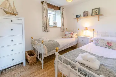 a bedroom with two twin beds and a dresser at 2 Bed in St. Martin oc-b33429 in Saint Martin