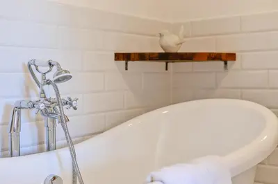 a white bath tub in a bathroom with a toilet at 2 Bed in St. Martin oc-b33430 in Saint Martin