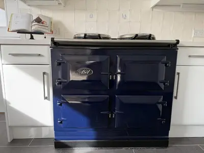 a blue stove top oven in a kitchen at 42 Little Trelyn in Wadebridge