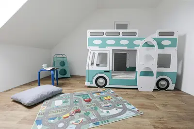 a childs bedroom with a toy bus bunk bed at Penn Cottage perfect for North Cornwall trips in Camelford