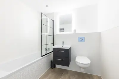 a white bathroom with a toilet and a sink at 5 Bed in St. Ives oc-c28961 in Saint Ewe