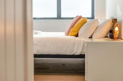 a bedroom with a bed with pillows on it at 2 Bed in Tintagel oc-p33627 in Tintagel