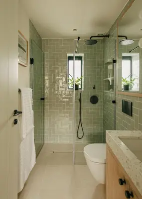 a bathroom with a shower with a toilet and a sink at Seaside Cottage in St Ives in St Ives