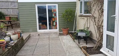 a front door of a house with plants on it at Chy An Geddon in Penryn