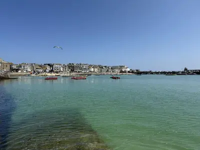 a large body of water with boats in it at Seabreeze in St Ives
