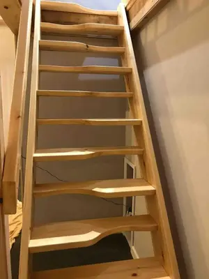a ladder up to the top of a bunk bed at Little Tregue in Camelford
