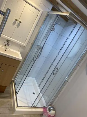 a glass ceiling in a bathroom with a sink at Little Tregue in Camelford