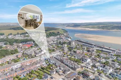 an aerial view of a city with a house at 3 Bed in Padstow oc-f33036 in Padstow