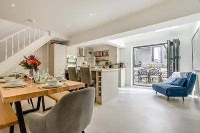 a kitchen and dining room with a table and chairs at 3 Bed in Padstow oc-f33036 in Padstow