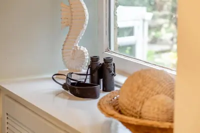 a window sill with a fan and a basket at 2 Bed in St. Ives oc-g33644 in St Ives