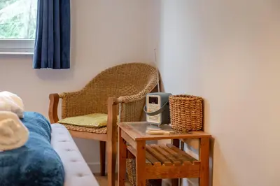 a room with a table with a phone on it at 2 Bed in St. Ives oc-g33644 in St Ives