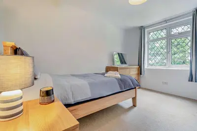 a bedroom with a bed and a window at 2 Bed in Advent oc-p6188 in Camelford