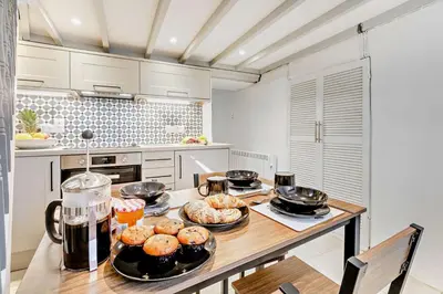 a kitchen with a table with some food on it at 2 Bed in Advent oc-p6188 in Camelford