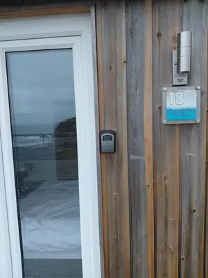 a door to a room with a sign on it at Millendreath Oean View Villa in Saint Martin