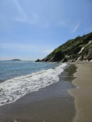 a sandy beach with the ocean on a sunny day at Millendreath Oean View Villa in Saint Martin