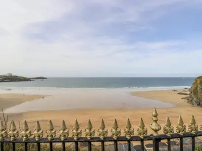 a view of the beach from a fence at Sea Boots in Newquay