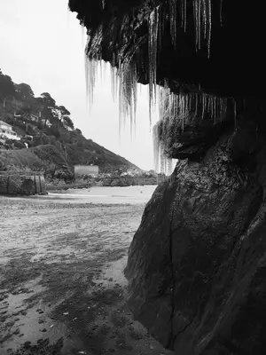 an image of icicles hanging from a rock on a beach at Hideaway Cottage in Polperro