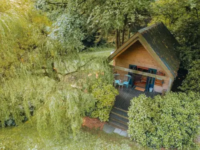 an overhead view of a cabin in the woods at The Beech Hut, Wood Fired Hot Tub, St Kew Escapes in Saint Kew