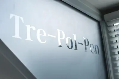 a sign for a potential company on a wall at The Attic, Tre-Pol-Pen in St Ives