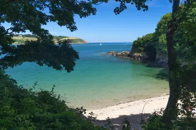 a view of the beach from a bluff at The Quaker Hall - Private Deck - Stunning Views in Falmouth