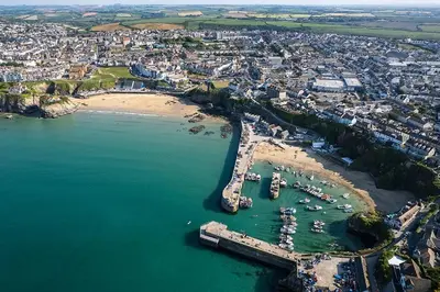 an aerial view of a harbor with boats in the water at 1 Bed Apartment in Town Centre in Newquay