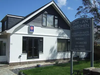 a house with a sign in front of it at Chy an Gwedhen in St Ives