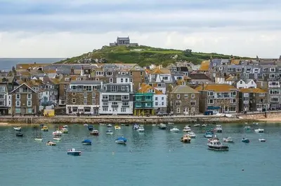 a group of boats in the water in a harbor at Heart of St Ives with parking - 2 bedrooms in St Ives