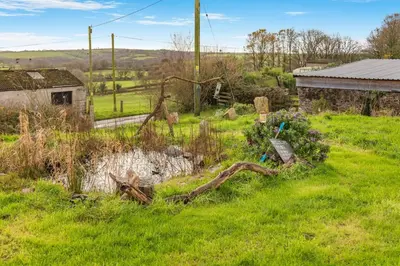 a yard with a fence and some green grass at 1 Bed in Widegates oc-j34234 in Sheviock