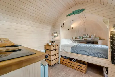 a bedroom in a dome shaped room with a bed at 1 Bed in Widegates oc-p34233 in Sheviock