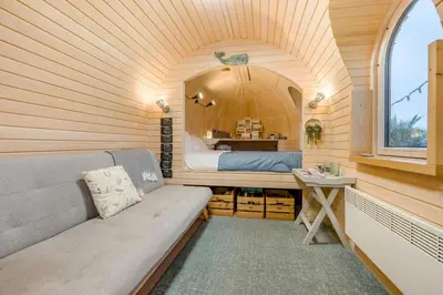 a small room with a couch in a tiny house at 1 Bed in Widegates oc-p34236 in Sheviock