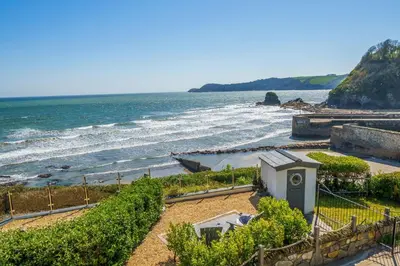a view of a beach with the ocean at Harbour Lights in Charlestown