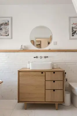a bathroom with a sink and a mirror at Premium 3BR Cottage Sauna EV Newquay in Newquay