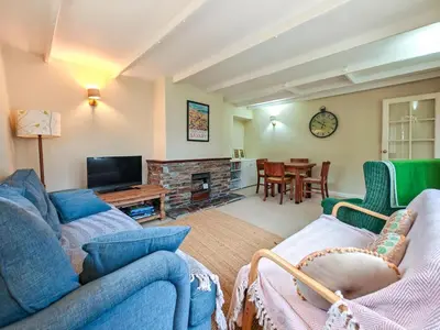 a living room with two couches and a tv at 3 Bed in St. Merryn oc-l34453 in St Merryn