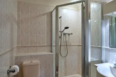 a bathroom with a shower with a toilet and a sink at Finest Retreats - 20 Chy Lowen in Newquay