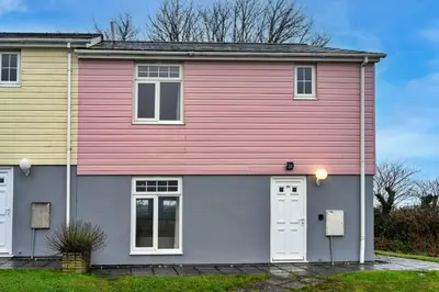 a red and white house with two windows at Finest Retreats - 20 Chy Lowen in Newquay
