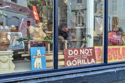 a sign in the window of a store at Finest Retreats - Pobbles Place in Fowey