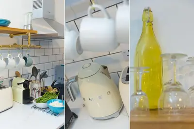 a kitchen counter with a blender and a bottle of wine at Dan's Den in St Ives