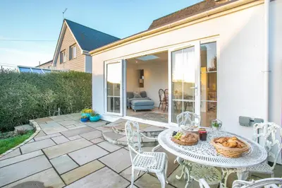 a patio with a table and chairs on a patio at 2 Bed in Mylor Bridge oc-p34490 in Mylor Bridge