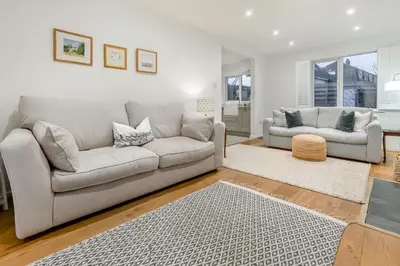 a living room with a couch and a table at 2 Bed in Mylor Bridge oc-p34490 in Mylor Bridge