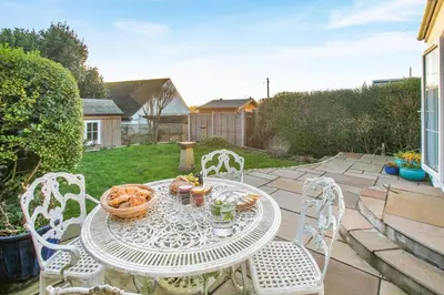 a white table and chairs on a patio at 2 Bed in Mylor Bridge oc-p34490 in Mylor Bridge