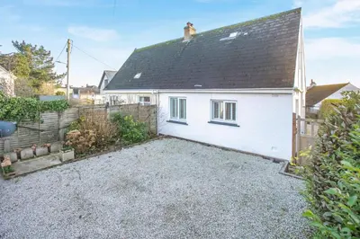a white house with a black roof at 2 Bed in Mylor Bridge oc-p34490 in Mylor Bridge