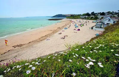 a group of people on a beach near the water at 2 Bed in Mylor Bridge oc-p34490 in Mylor Bridge