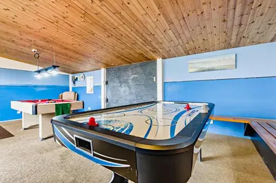 a room with a ping pong table and a pool table at 4 Bed in St. Gennys oc-p34626 in Crackington Haven